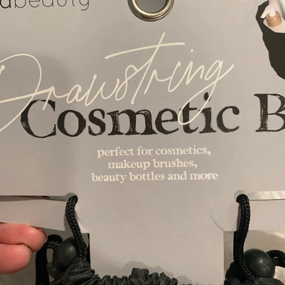 NWT Bella beauty black drawstring cosmetic bag.Perfect gift!